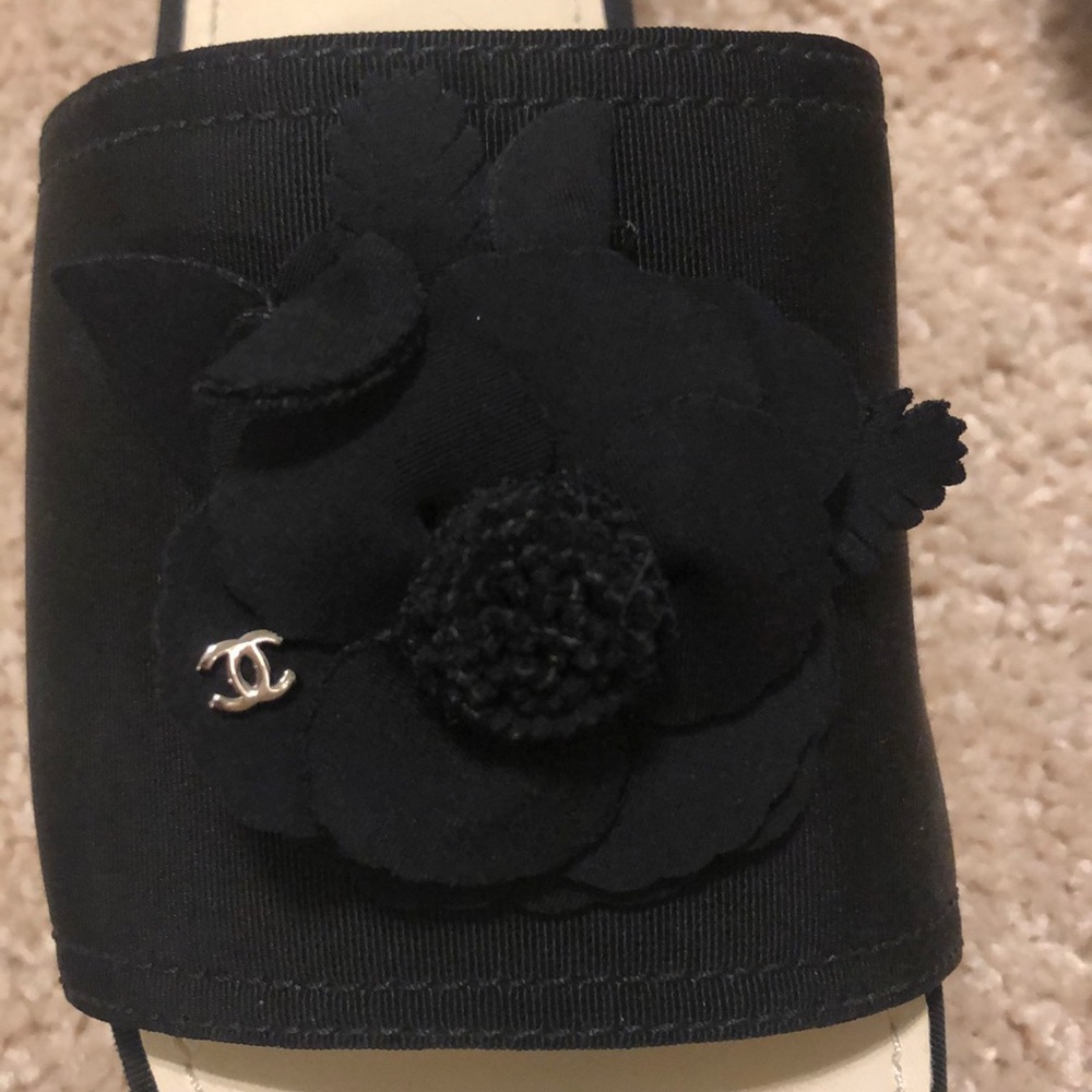 Black Camellia Chanel Slip Ons - Picture 3 of 6